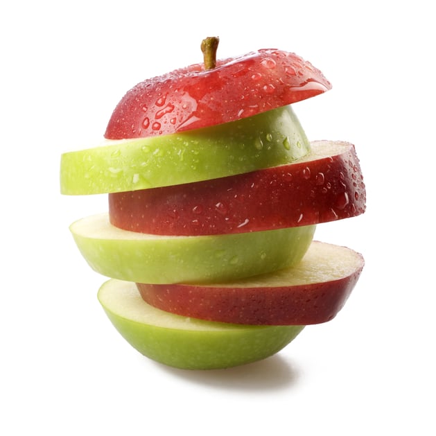 Apple slices made up of red and green on top of each other